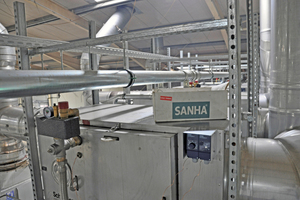 Während der Installation: Sanha-Fittings und -Rohre wurden für die Wärmeauskopplung eingesetzt, hier im Umfeld eines Abgaswärmetauschers von Schräder. 