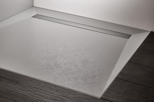  Das Duschbodenelement mit strukturierter „RenoDeco“-Oberfläche garantiert eine hohe Trittsicherheit und lässt sich zusammen mit den „RenoDeco“ Wandverkleidungen in einem Look gestalten.  