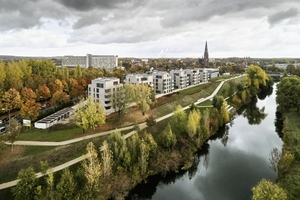  82 Wohneinheiten bietet der Neubau des Ensembles aus acht Gebäuden auf einer ehemaligen Industriebrache unmittelbar am Ufer der Lippe. 