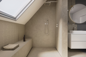  Mit Hilfe des Vorwandinstallationssystems „Prevista“ wird das Badezimmer in unterschiedliche Bereiche unterteilt. Die raumhohe Trennwand für die Duschzone bietet Sichtschutz.  
