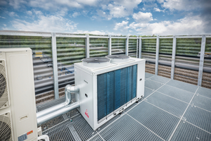  Eine effiziente Buderus Luft-Wasser-Wärmepumpe mit 36 kW Leistung ist Teil des neuen bivalenten Heizsystems. Sie ist auf dem Dach des Bürogebäudes installiert.  