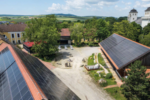  <div class="bildtext_1">Luftansicht des AWS Solutions Hub mit PV-Anlage.</div> 