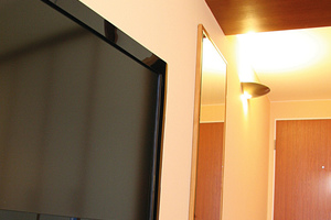  Die eleganten „Artcool Energy“-Wandgeräte fügen sich gut in das Ambiente des Hotelzimmers ein. 
